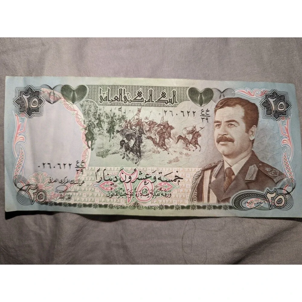 Saddam Hussein real paper money got during the war. Was worth $100 then.